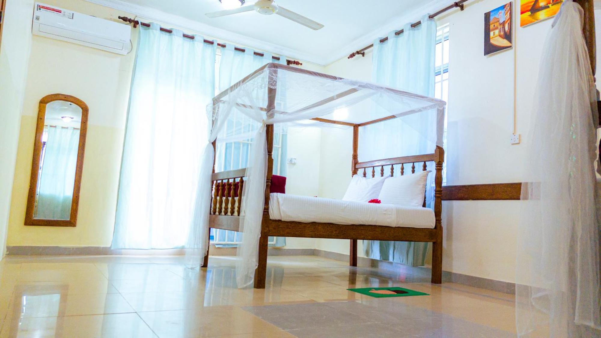 Sands Inn Hotel Pwani Mchangani Kültér fotó