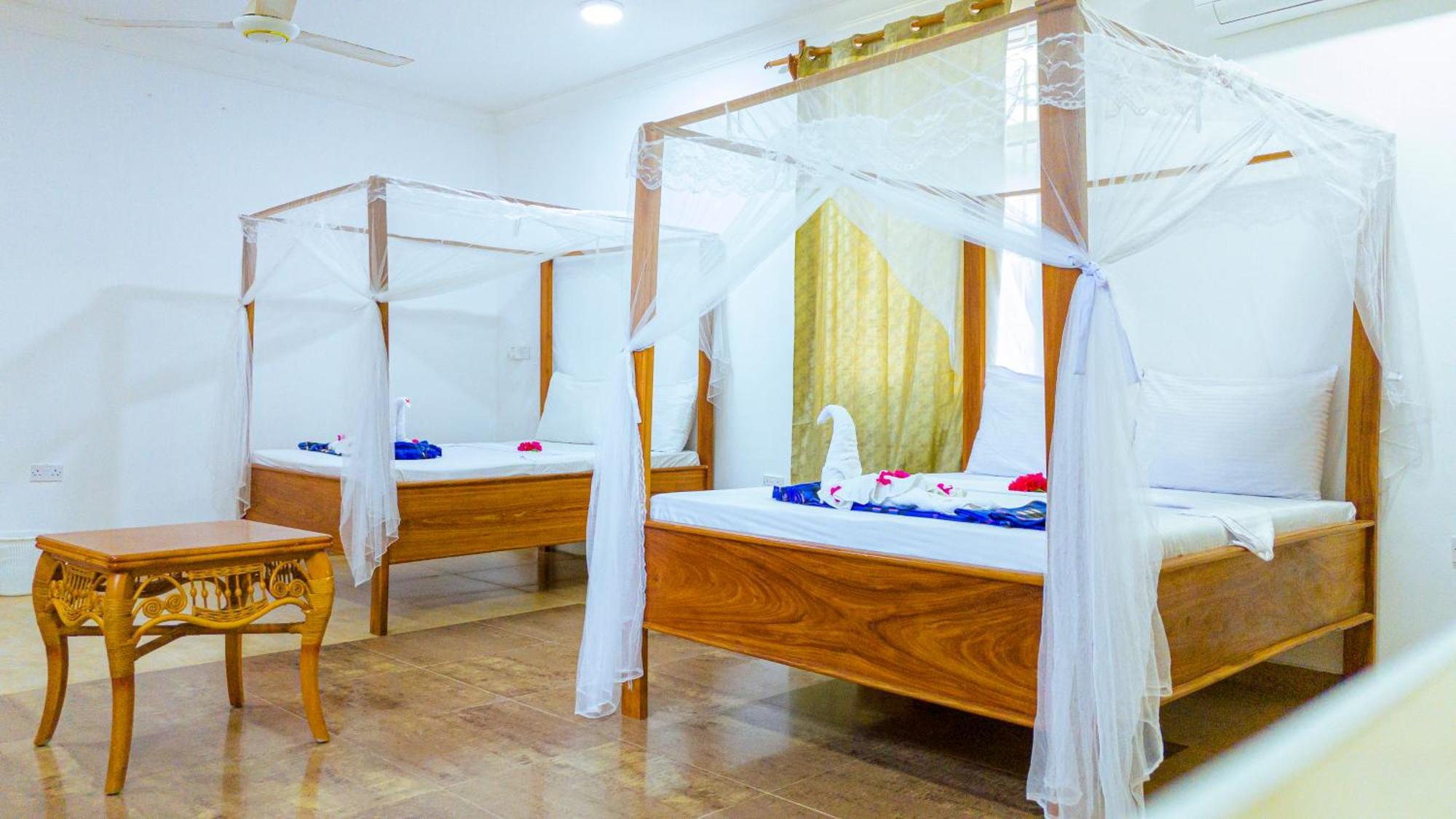 Sands Inn Hotel Pwani Mchangani Kültér fotó