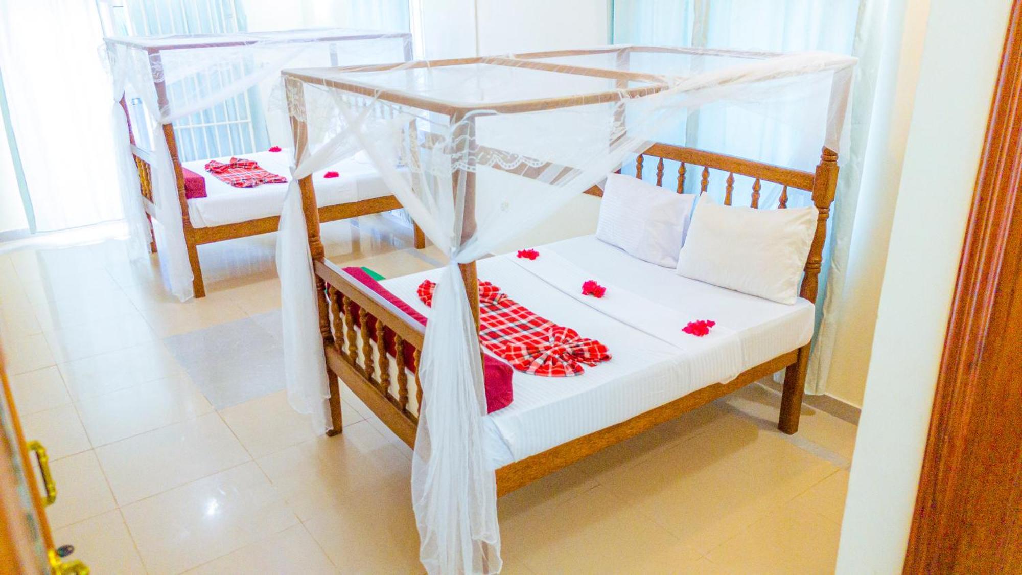 Sands Inn Hotel Pwani Mchangani Kültér fotó
